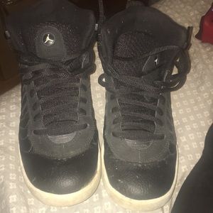 These are black Jordan jump man sneakers